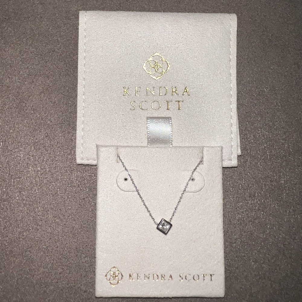 Solid 14k and genuine diamond necklace.